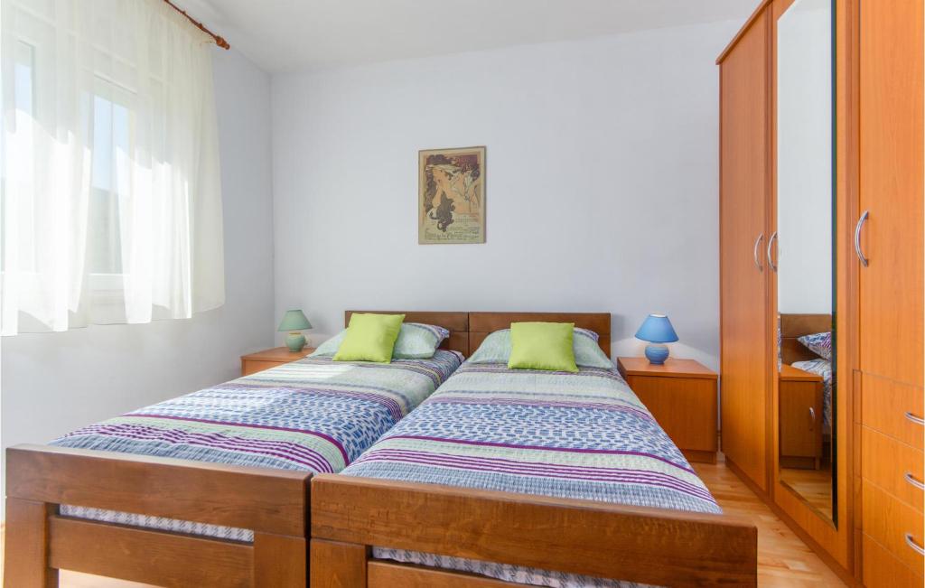 Postel nebo postele na pokoji v ubytování Apartment Marina Iv