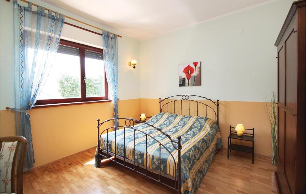Postel nebo postele na pokoji v ubytování Apartment Sad Ii