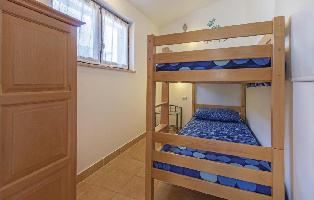 Postel nebo postele na pokoji v ubytování Apartment Sad Ii