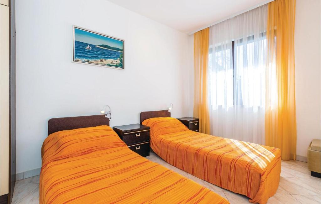 Łóżko lub łóżka w pokoju w obiekcie 2 Bedroom Gorgeous Apartment In Matulji