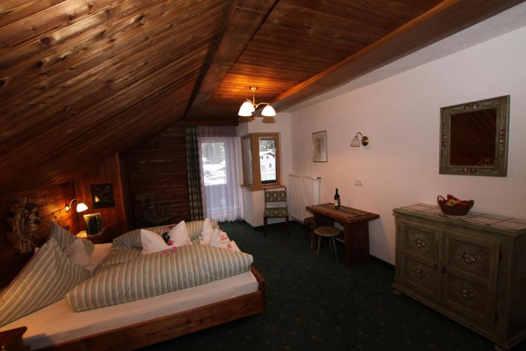 Postel nebo postele na pokoji v ubytování Gasthof zur Mühle