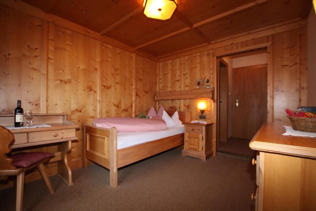 Postel nebo postele na pokoji v ubytování Gasthof zur Mühle