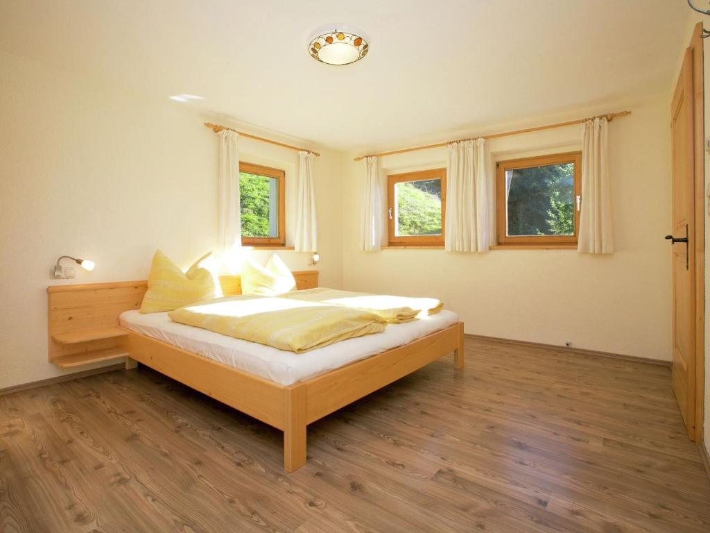 Posteľ alebo postele v izbe v ubytovaní Chalet with hot tub