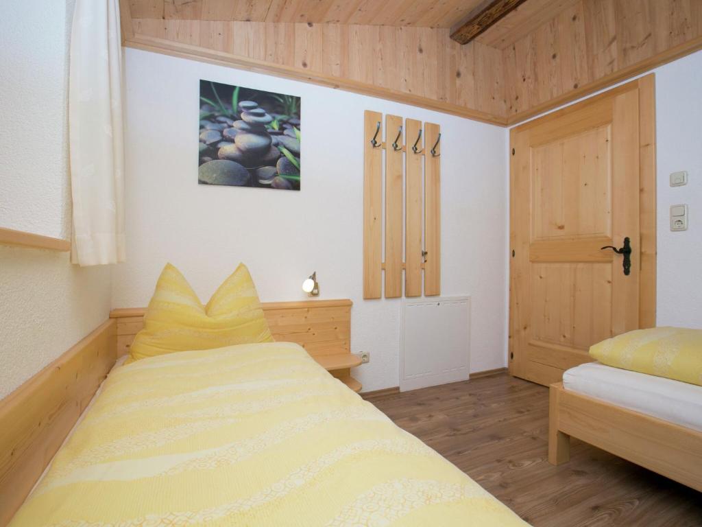 Posteľ alebo postele v izbe v ubytovaní Chalet with hot tub