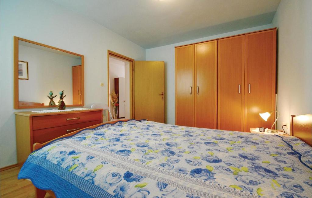 Łóżko lub łóżka w pokoju w obiekcie Holiday Home Marceljani Kolcic Breg