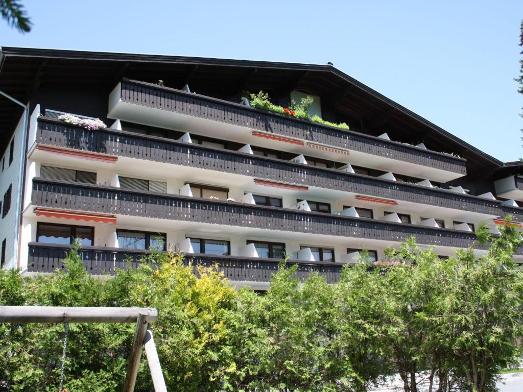 an apartment building with balconies on the side of it at Apartment in Maria Alm near ski area in Maria Alm am Steinernen Meer