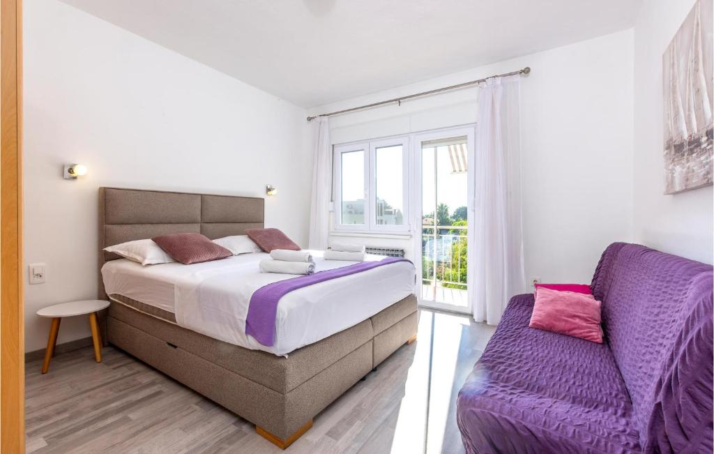 Posteľ alebo postele v izbe v ubytovaní Apartment Kastel Stari 19