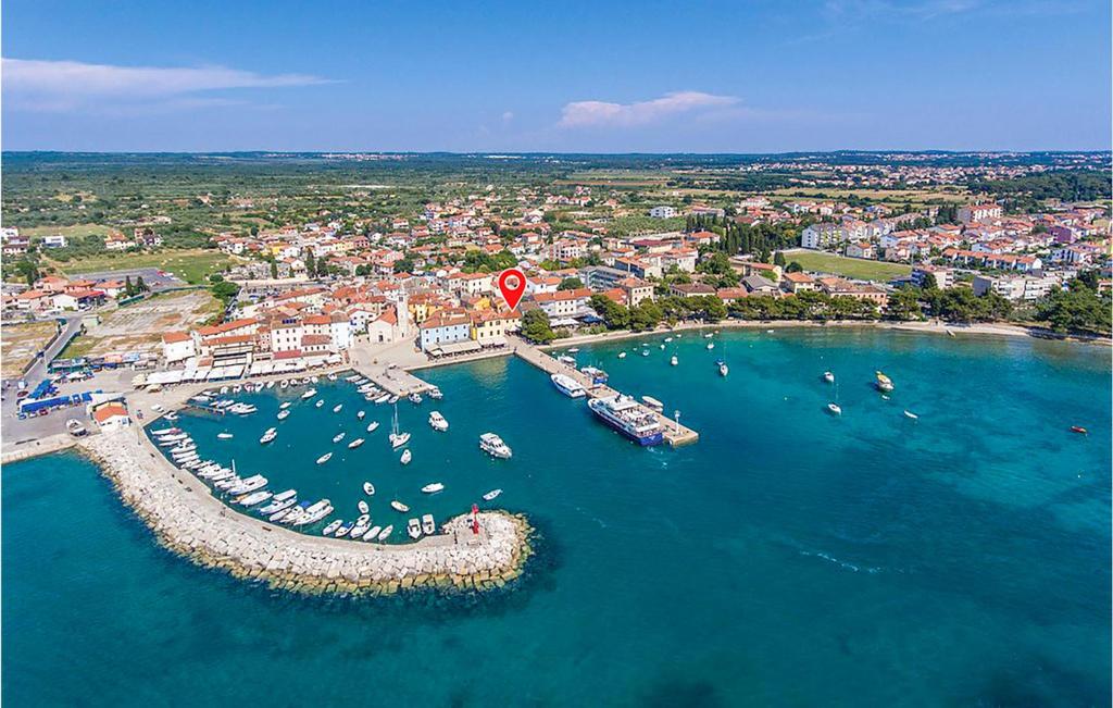 an aerial view of a harbor with boats in the water at Amazing Apartment In Fazana With 2 Bedrooms And Wifi in Fažana