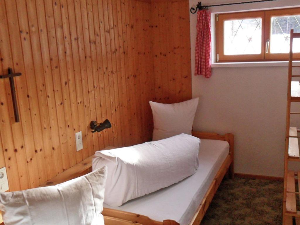 Postel nebo postele na pokoji v ubytování Holiday home in Sibratsgfäll in the Bregenzerwald