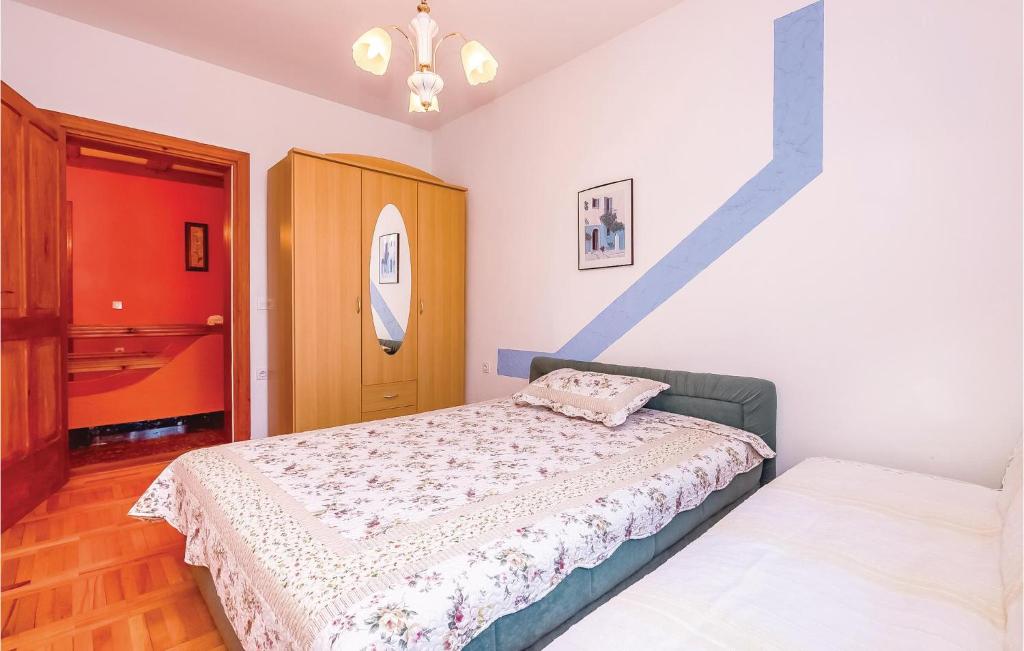 Posteľ alebo postele v izbe v ubytovaní Beautiful Apartment In Crikvenica