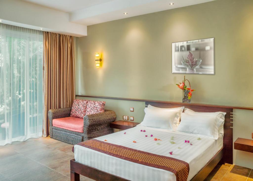 Postel nebo postele na pokoji v ubytování Dodola Lodge