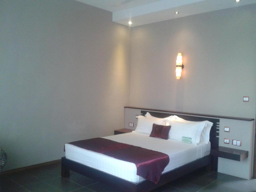 Postel nebo postele na pokoji v ubytování Dodola Lodge