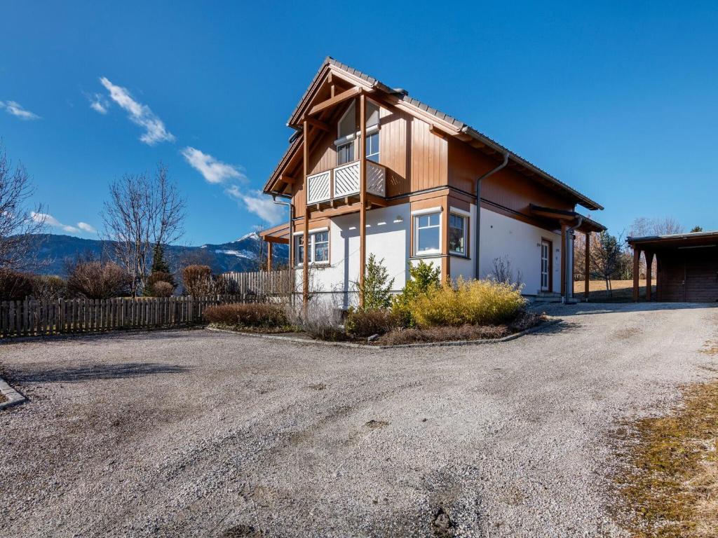 a house with a gravel driveway at Country house in St Georgen im Gailtal near Nassfeld in Sankt Georgen im Gailtal