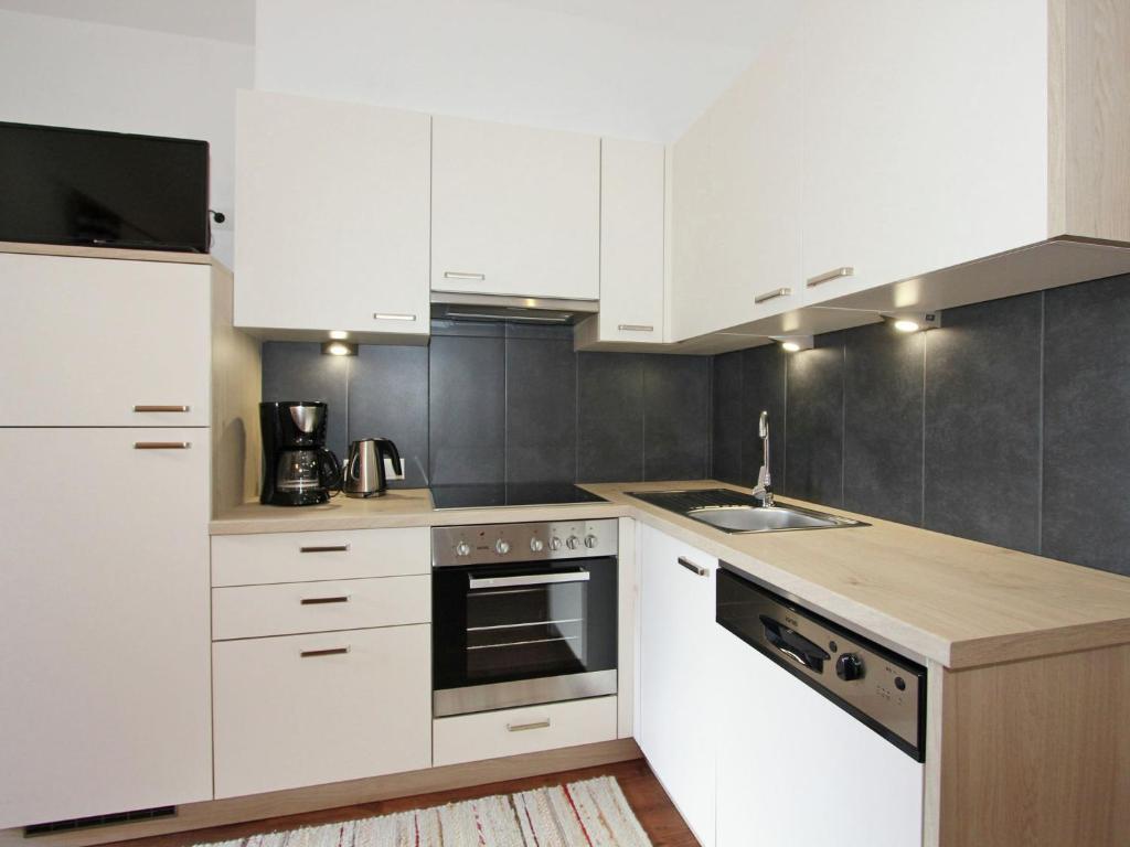 Kuchyňa alebo kuchynka v ubytovaní Apartment in Fügenberg near Ski Slopes