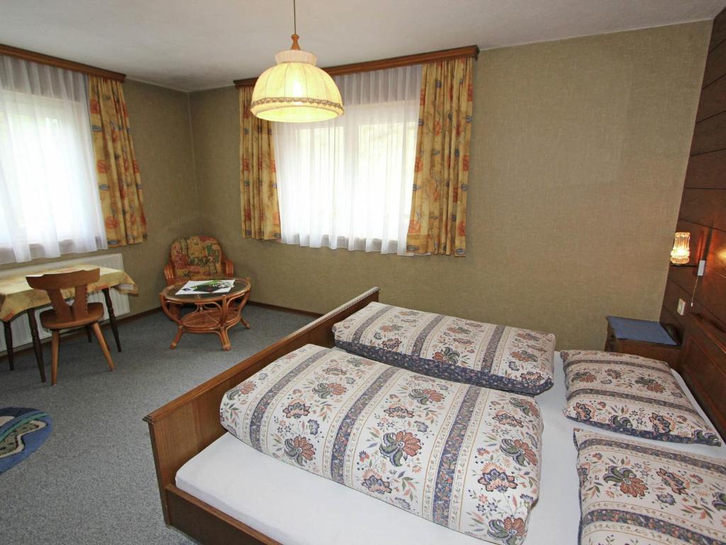 Postel nebo postele na pokoji v ubytování Apartment Außervillgraten near Ski Bus