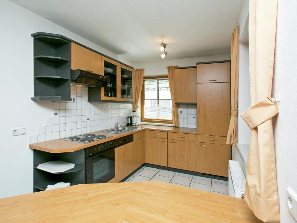 Kuchyňa alebo kuchynka v ubytovaní Apartment with atmosphere in Längenfeld