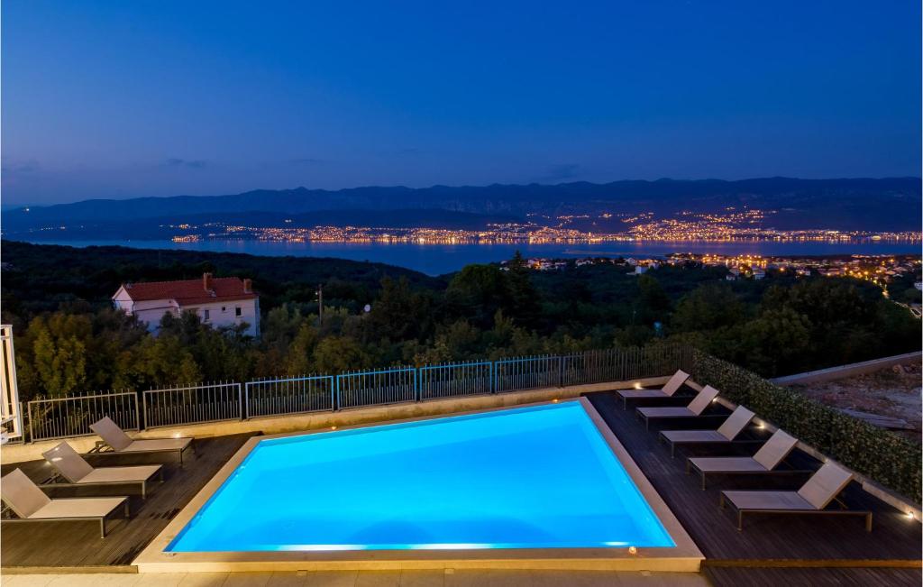a swimming pool on the roof of a house at Awesome Home In Polje With House Sea View in Polje