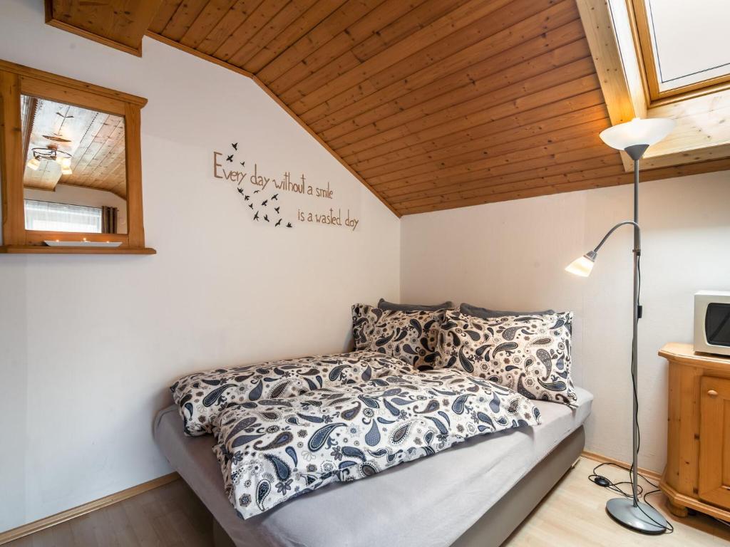 Postel nebo postele na pokoji v ubytování Apartment in Tröpolach Carinthia with pool