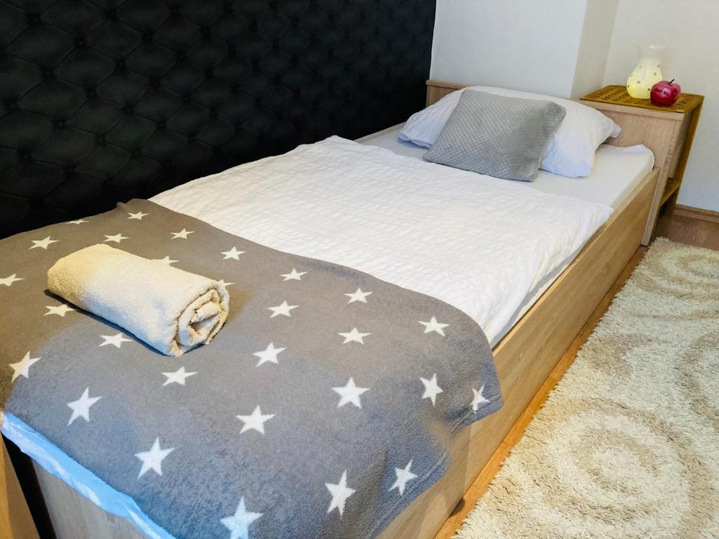 Posteľ alebo postele v izbe v ubytovaní Origo Apartman