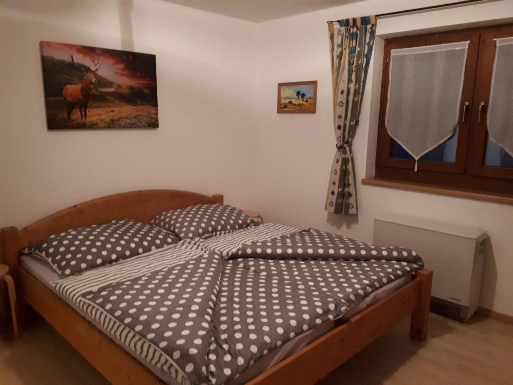 Posteľ alebo postele v izbe v ubytovaní Spacious holiday home near the ski area