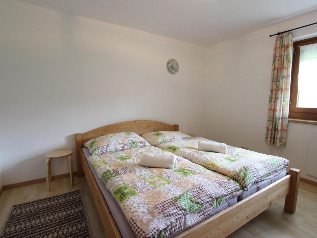 Posteľ alebo postele v izbe v ubytovaní Spacious holiday home near the ski area