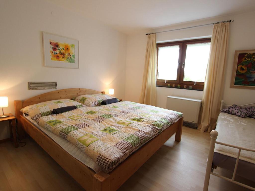Posteľ alebo postele v izbe v ubytovaní Spacious holiday home near the ski area