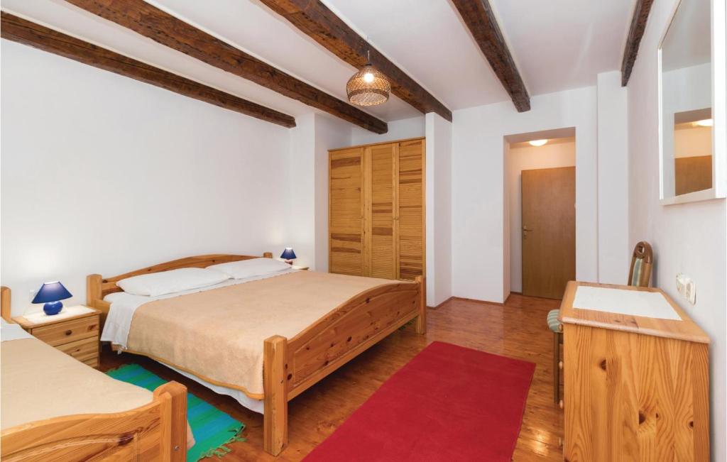 Łóżko lub łóżka w pokoju w obiekcie Holiday Home Ul,biskupa Josipa Marcelica Cr