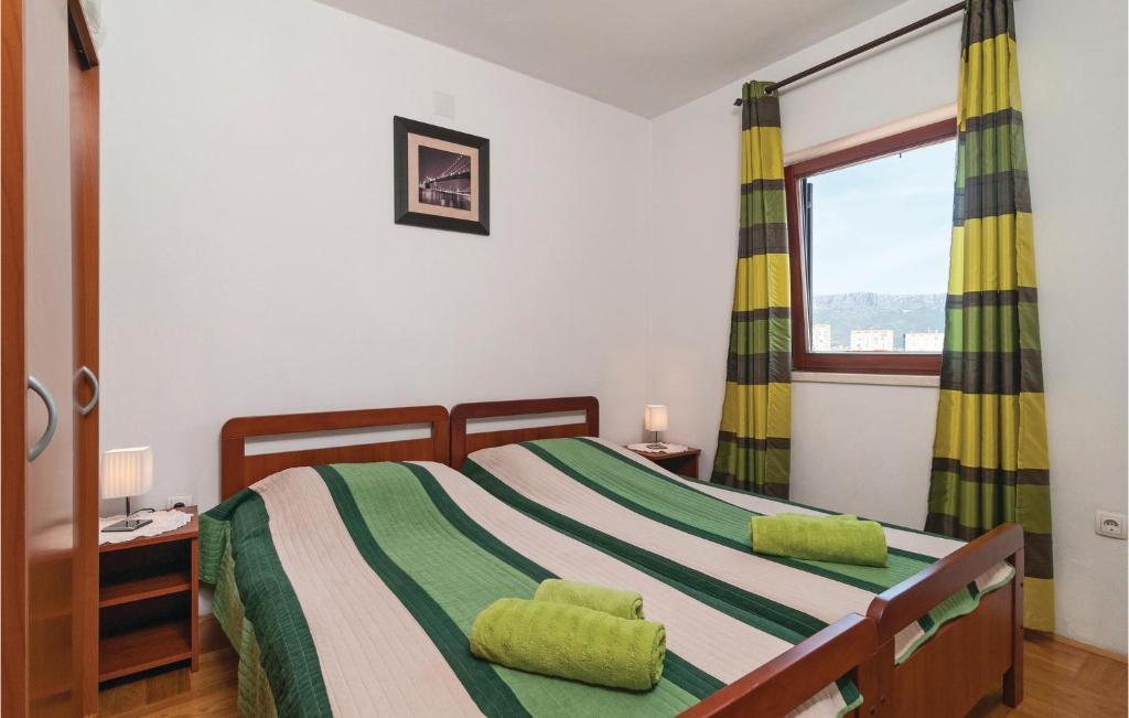 Posteľ alebo postele v izbe v ubytovaní Two-Bedroom Apartment In Split