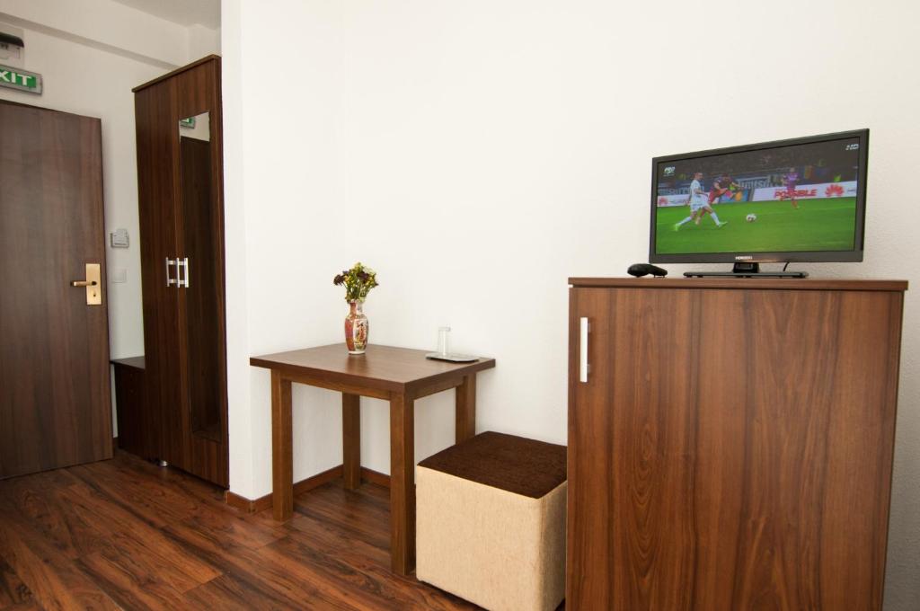 TV a/nebo společenská místnost v ubytování Hotel Hyperion