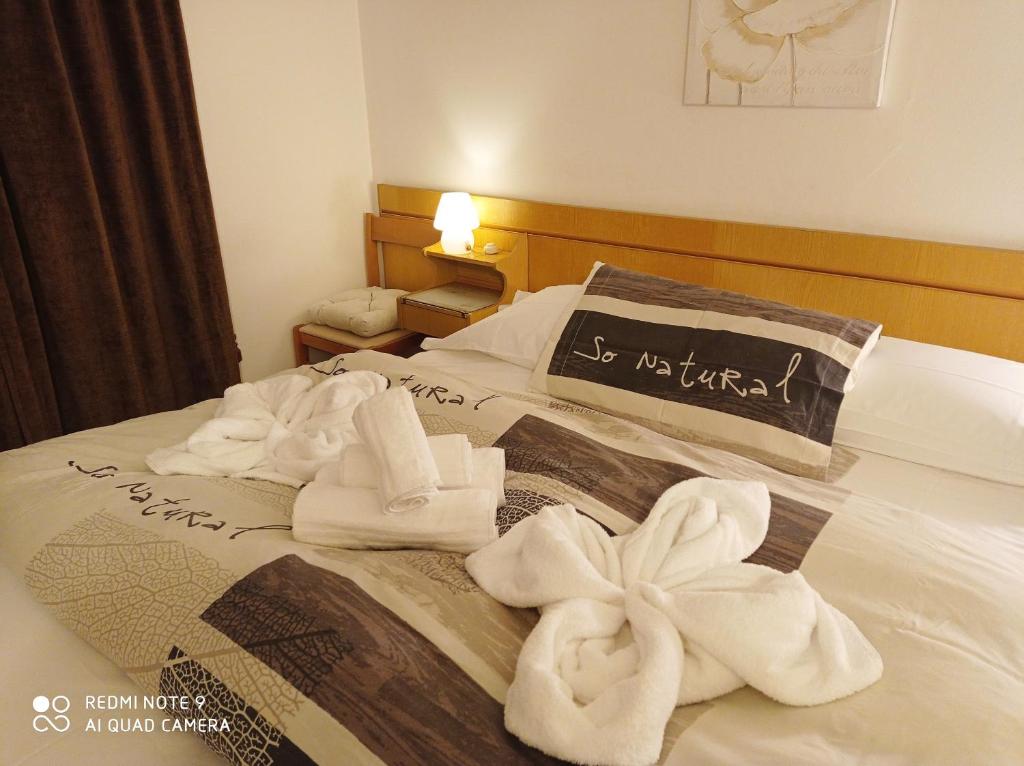 Postel nebo postele na pokoji v ubytování Mini hotel