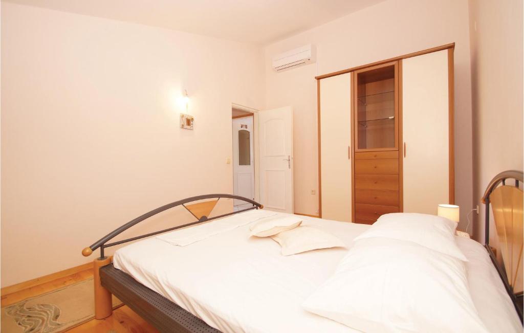 Posteľ alebo postele v izbe v ubytovaní Apartment Karbuni Bb Ii