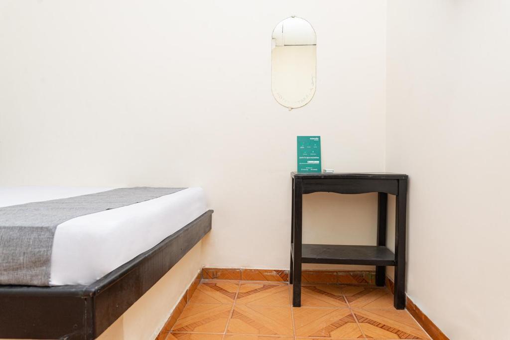 Postel nebo postele na pokoji v ubytování Hotel Itaka