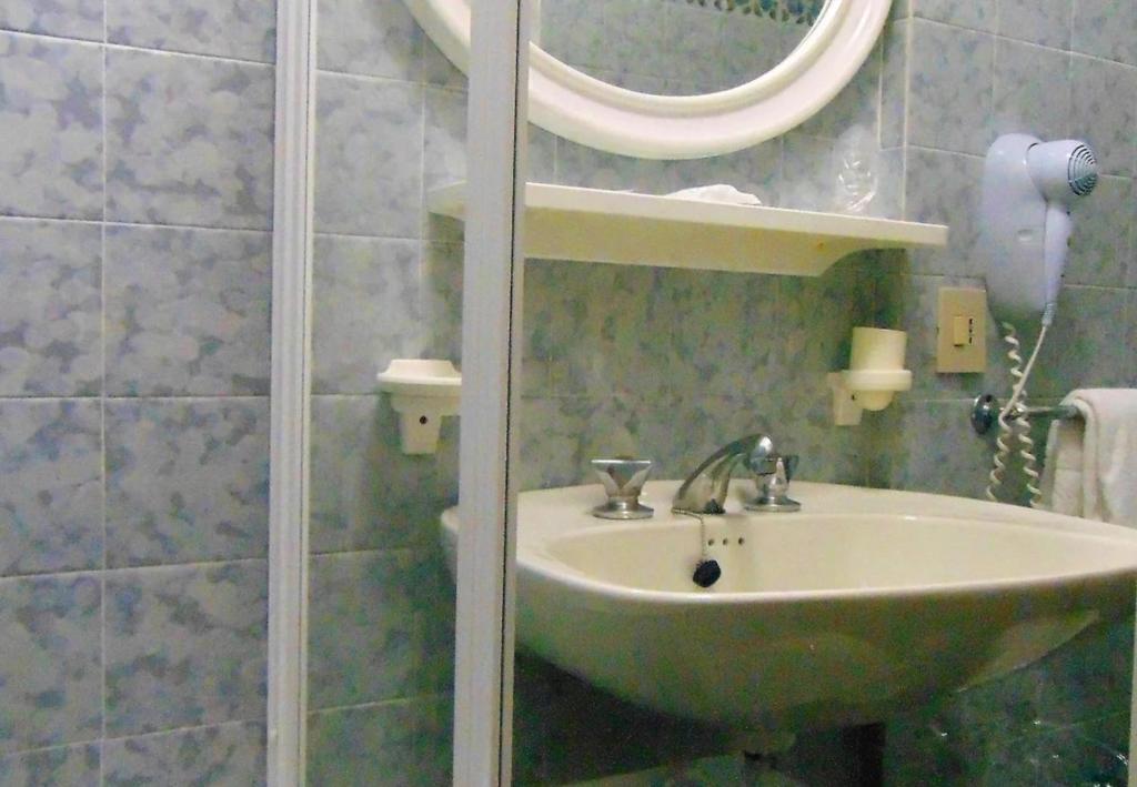 Koupelna v ubytování Hotel Columbus
