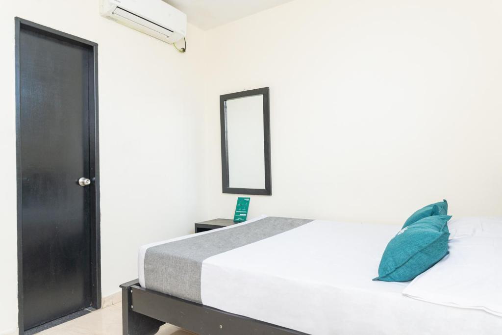Postel nebo postele na pokoji v ubytování Hotel Itaka