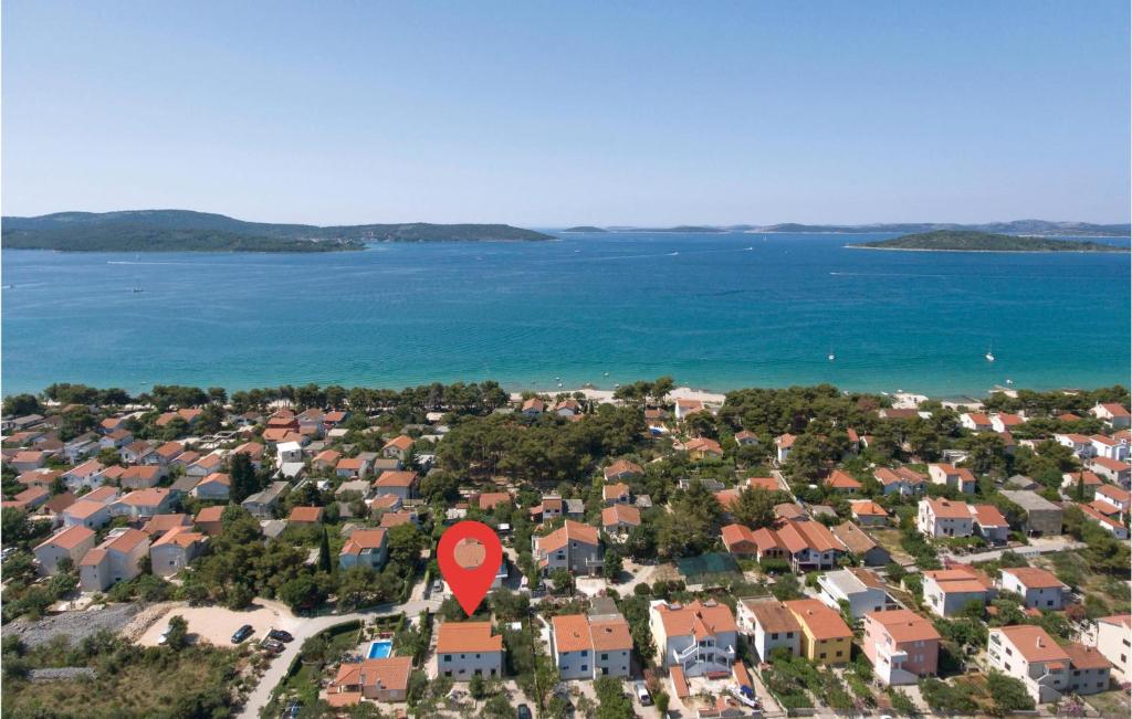 an aerial view of a suburb with a red marker at Lovely Home In Sibenik With Kitchen in Šibenik