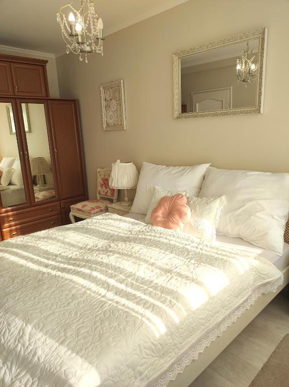 Postel nebo postele na pokoji v ubytování Strandfürdő Apartman