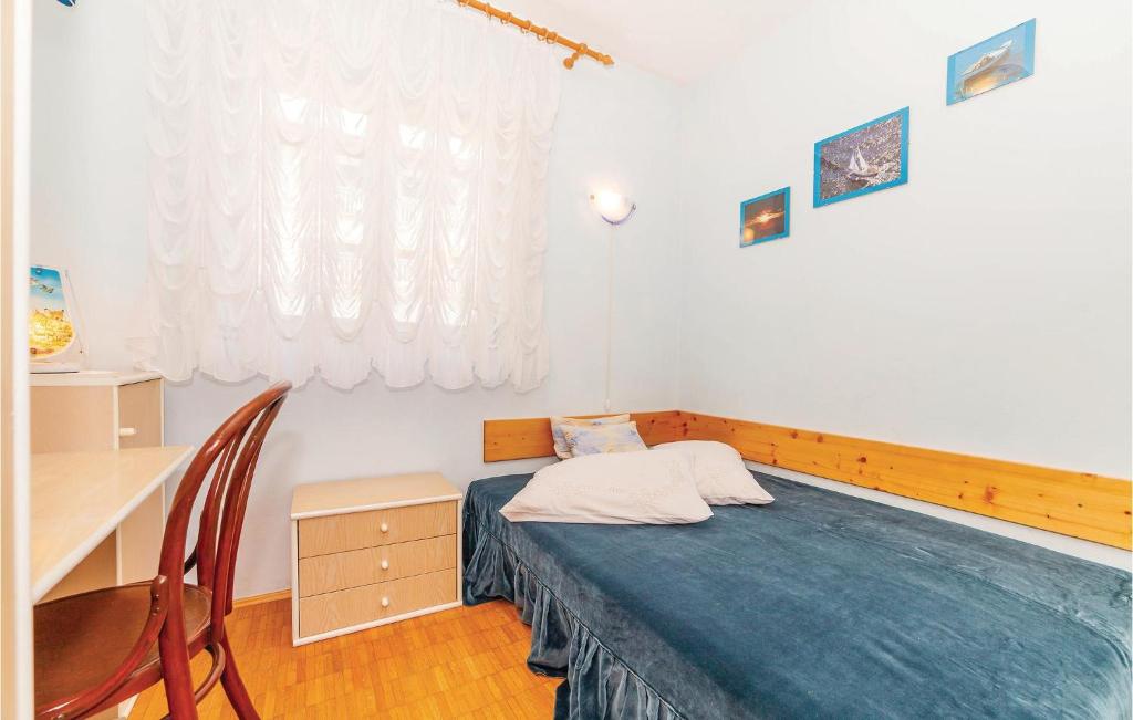 Postel nebo postele na pokoji v ubytování Nice Apartment In Crikvenica