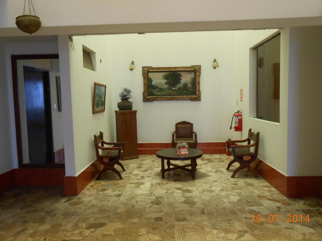 Posezení v ubytování Hostal Cesar Alberto