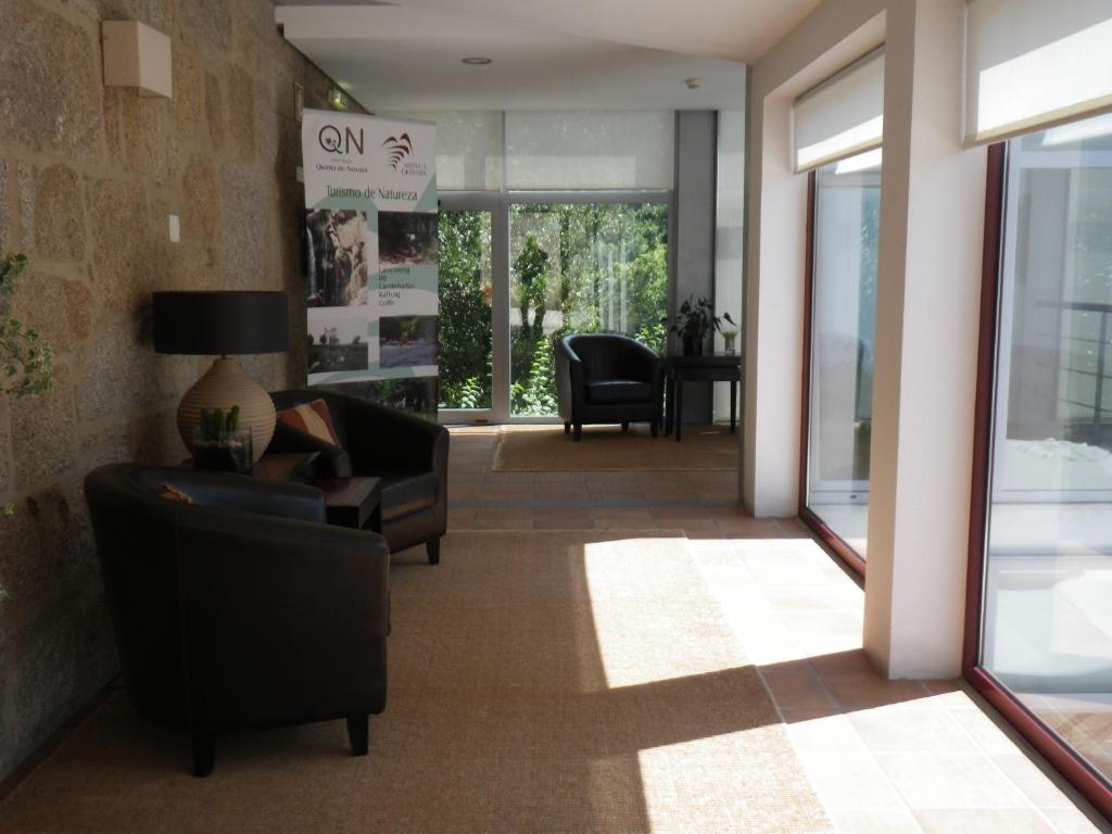 Uma área de estar em Hotel Rural Quinta de Novais