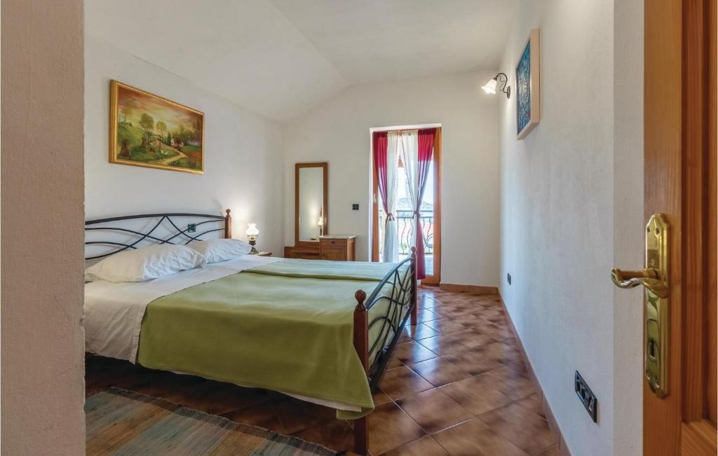 Łóżko lub łóżka w pokoju w obiekcie Holiday Home Klarinska Br, Iv