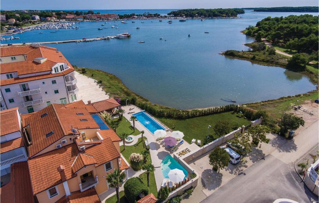 an aerial view of a resort with a body of water at Amazing Apartment In Medulin With Kitchen in Medulin