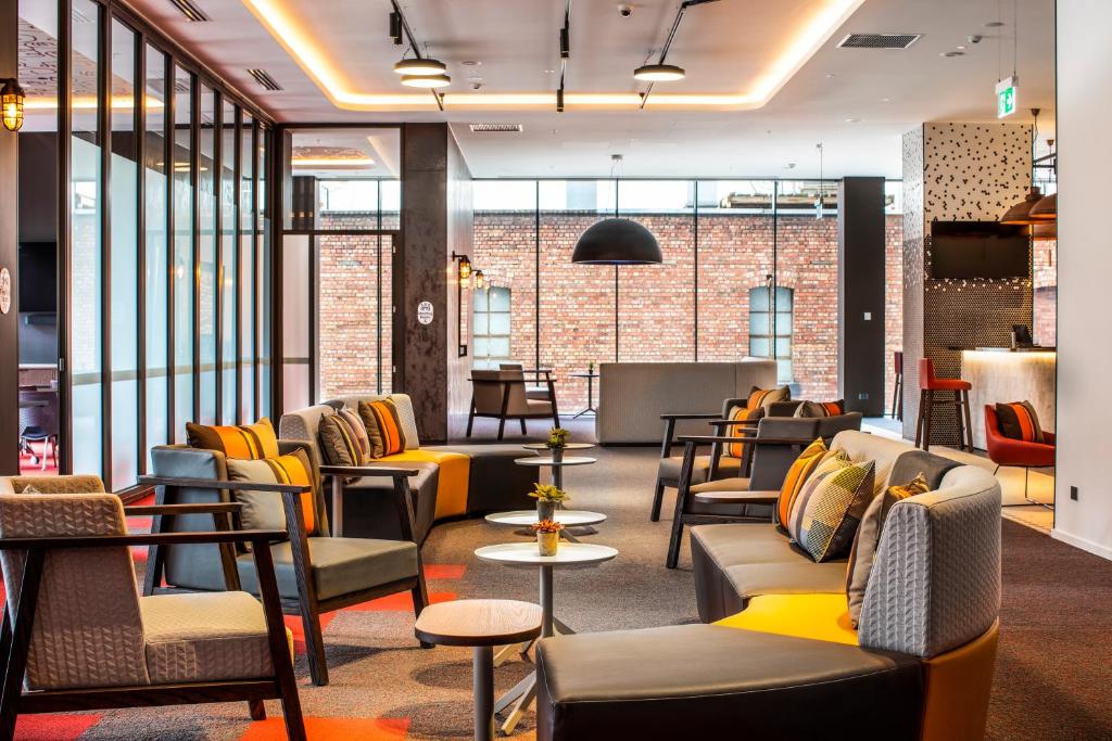 Posezení v ubytování Holiday Inn Express Melbourne Little Collins by IHG