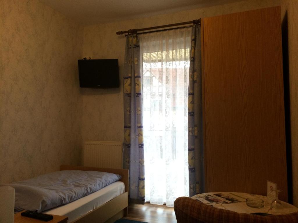 TV a/nebo společenská místnost v ubytování Gasthaus Breitenbach