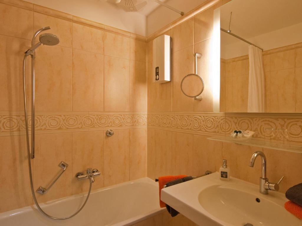 Koupelna v ubytování Park-Hotel