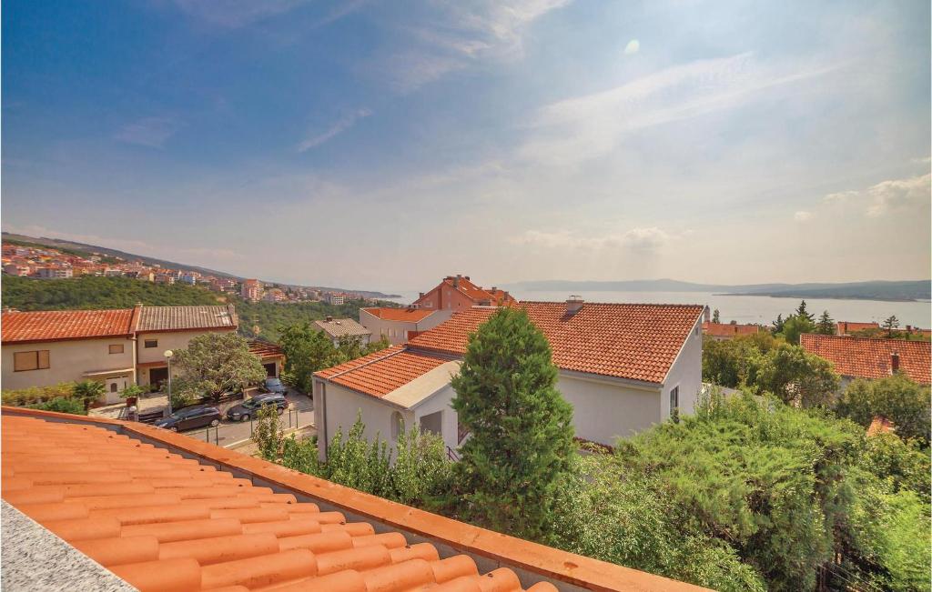 a view of a town from the roof of a building at 2 Bedroom Amazing Apartment In Crikvenica in Crikvenica