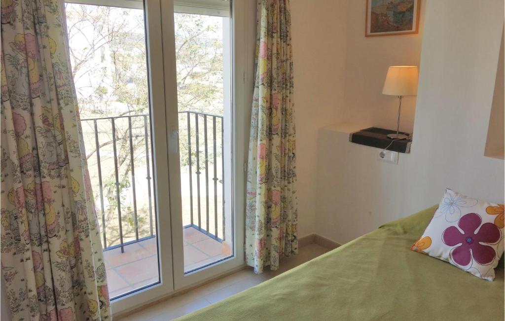 A bed or beds in a room at Hacienda Riquelme