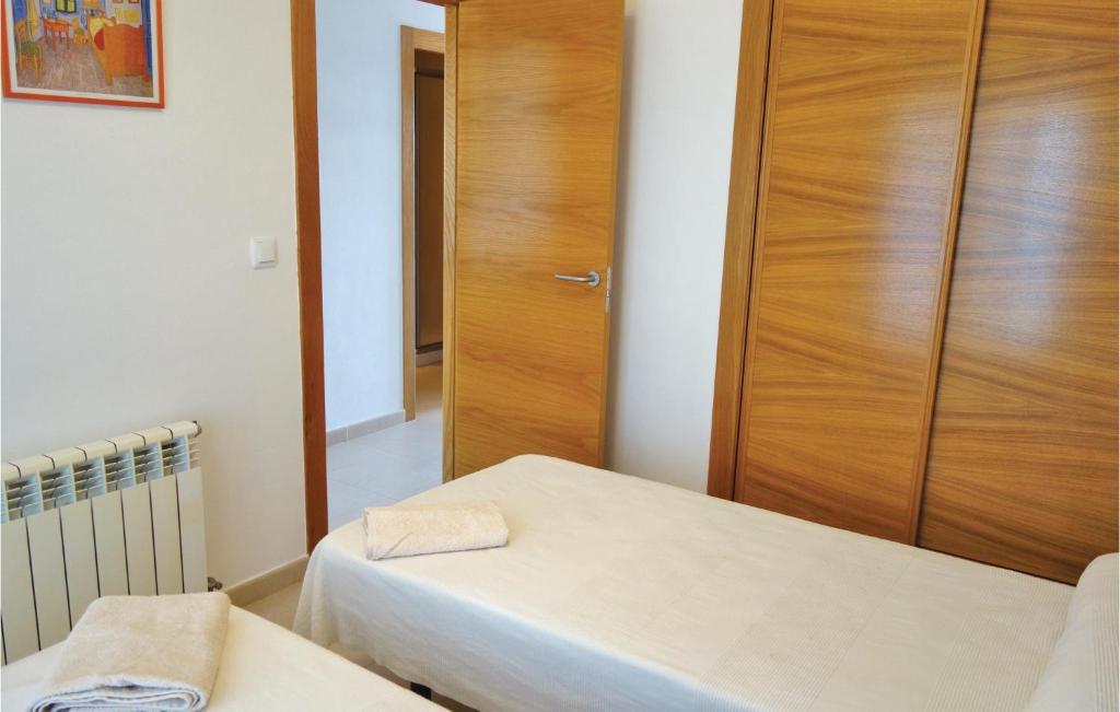 A bed or beds in a room at Hacienda Riquelme
