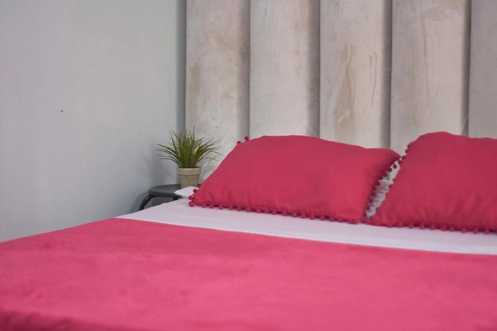 Letto o letti in una camera di Hostal Casa Estación