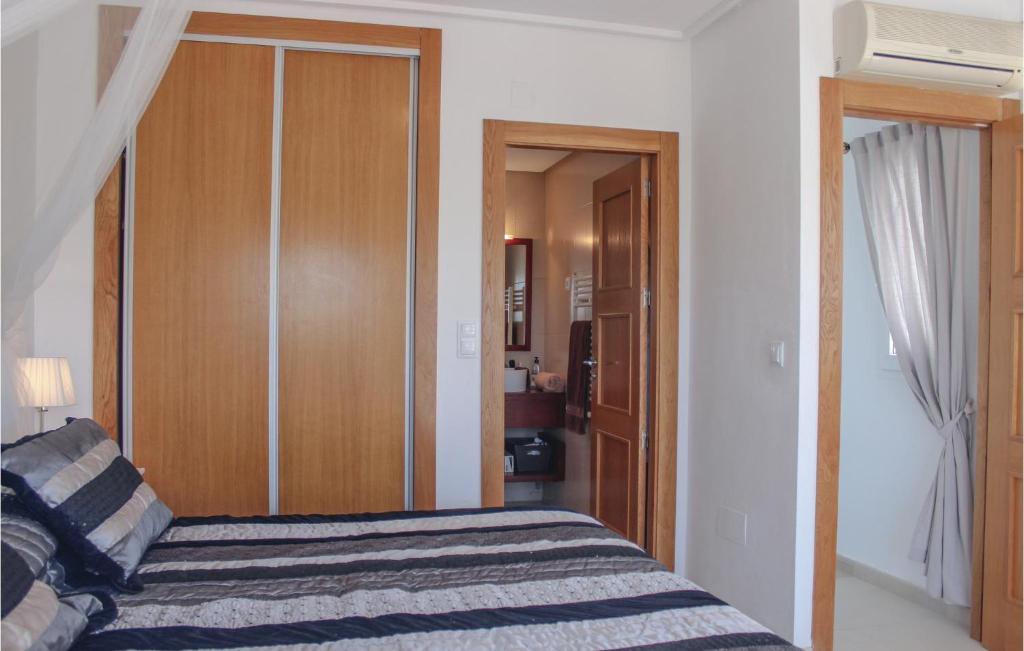 Postel nebo postele na pokoji v ubytování 2 Bedroom Cozy Home In Torre-Pacheco
