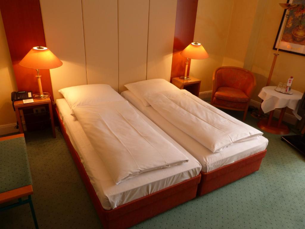 Postel nebo postele na pokoji v ubytování Hotel Vorbach